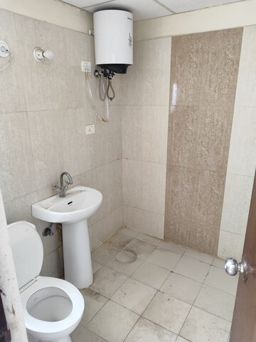 Bathroom in 2 BHK Apartment at Antriksh Golf View, Sector 78 – for Sale