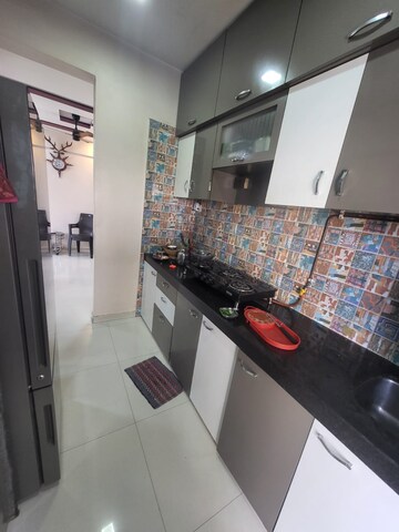 Kitchen in 2 BHK Apartment at Dweepmala Baline Dwellings, Ulwe Sector 18 – for Rent