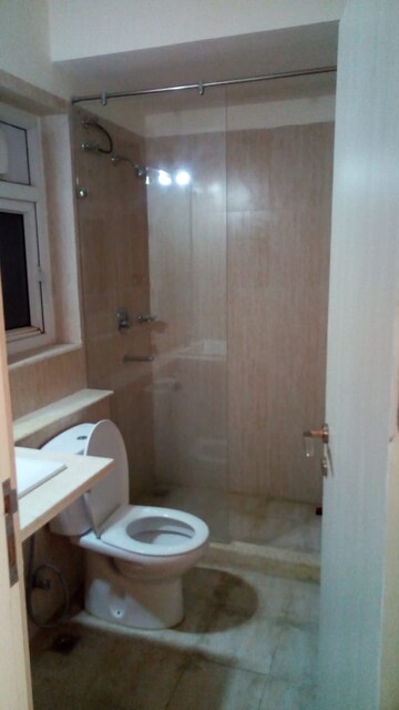 Bathroom in 3 BHK Apartment at DLF The Skycourt, Sector 86 – for Rent