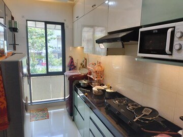 Kitchen in 2 BHK Apartment at Hiranandani Estate Hamilton, Patlipada – for Rent