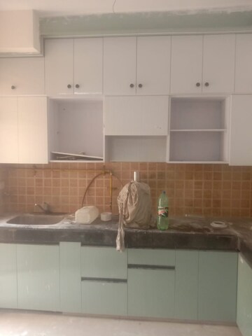Kitchen in 2 BHK Apartment at Mahagun Mywoods, Sector 16c Greater Noida – for Rent