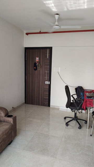 Living Room in 2 BHK Apartment at JP North Estella, Mira Road – for Sale