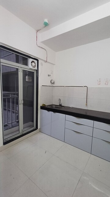 Kitchen in 2 BHK Apartment at Ashar Metro Towers, Vartak Nagar – for Rent