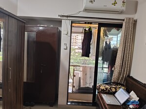 Living Room in 1 BHK Apartment at Haware Dahlia, Kasarvadavali – for Sale