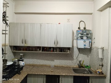 Kitchen in 3 BHK Apartment at Spring Meadows, Tech Zone 4 Greater Noida – for Rent