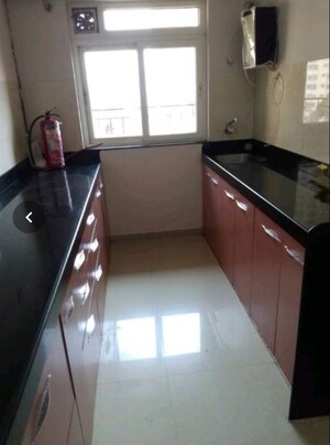 Kitchen in 2 BHK Apartment at Rustomjee Athena, Majiwada – for Sale