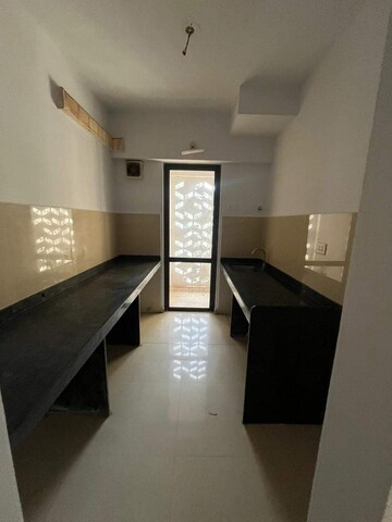 Kitchen in 2 BHK Apartment at Lodha Lakeshore Greens, Dombivli East – for Rent