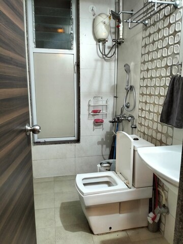 Bathroom in 1 BHK Apartment at Ajmera New Era, Kalyan West – for Rent