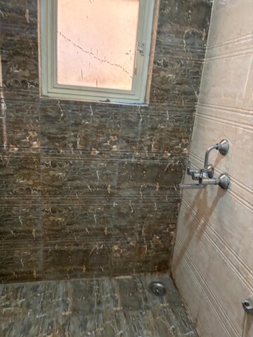 Bathroom in 3 BHK Apartment at Rishita Manhattan, Gomti Nagar – for Rent