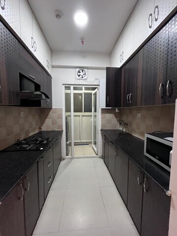 Kitchen in 2 BHK Apartment at Trident Embassy, Sector 1 Greater Noida – for Rent
