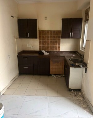 Kitchen in 2 BHK Apartment at Amrapali Zodiac, Sector 120 – for Sale