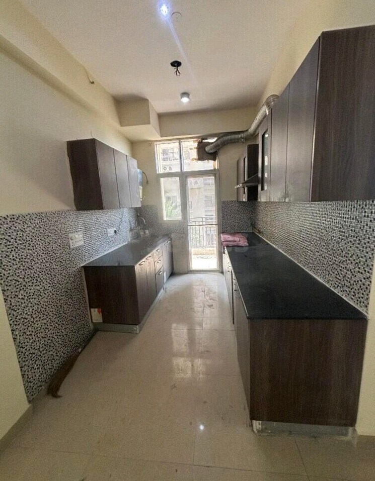 Kitchen, jm-aroma 3 Bedroom 993 Sq.Ft. Apartment In Sector 75 Noida 8682509
