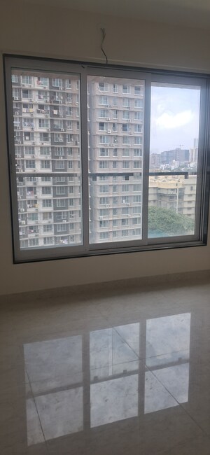 Room in 2 BHK Apartment at Triumph Swastik, Malad West – for Sale