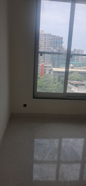 Room in 2 BHK Apartment at Triumph Swastik, Malad West – for Sale