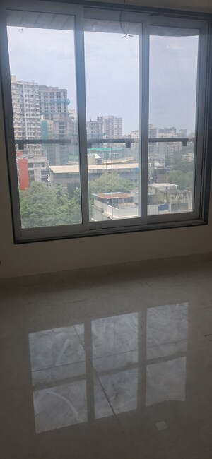 Room in 2 BHK Apartment at Triumph Swastik, Malad West – for Sale