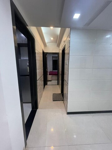 Building Lobby in 2 BHK Apartment at Express Apartment, Yari Road – for Rent