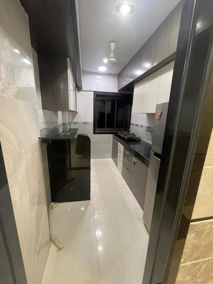 Kitchen, express-apartment 2 Bedroom 860 Sq.Ft. Apartment In Yari Road Mumbai 8682656