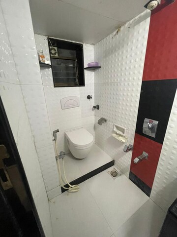 Bathroom in 2 BHK Apartment at Express Apartment, Yari Road – for Rent