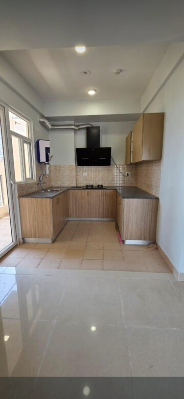 Kitchen in 3 BHK Apartment at Amrapali Crystal Homes, Sector 76 – for Rent
