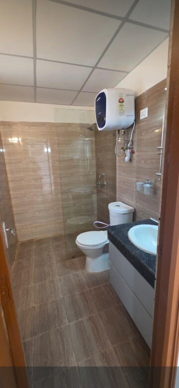 Bathroom in 3 BHK Apartment at Amrapali Crystal Homes, Sector 76 – for Rent