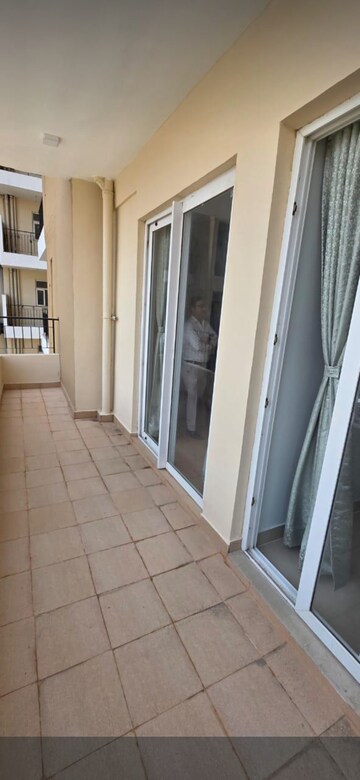 Balcony in 3 BHK Apartment at Amrapali Crystal Homes, Sector 76 – for Rent