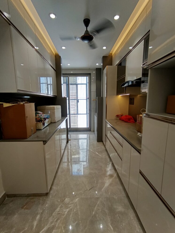 Kitchen, triveni-apartments-cghs 2.5 Bedroom 1000 Sq.Ft. Apartment In Paschim Vihar Delhi 8682774