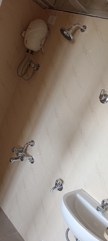 Bathroom in 1 BHK Apartment at Bageshri CHS, Goregaon East – for Rent