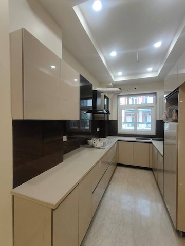 Kitchen in 4 BHK Apartment at Ansal API Esencia, Sector 67 – for Sale