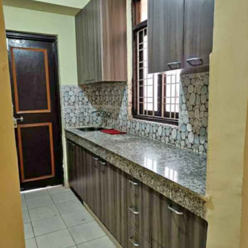 Kitchen in 2 BHK Apartment at Apex Our Residency, Garoli Kalan – for Rent