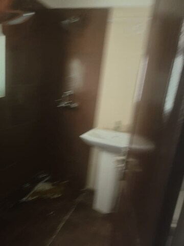 Bathroom in 3 BHK Apartment at Gardenia Golf City, Sector 75 – for Rent