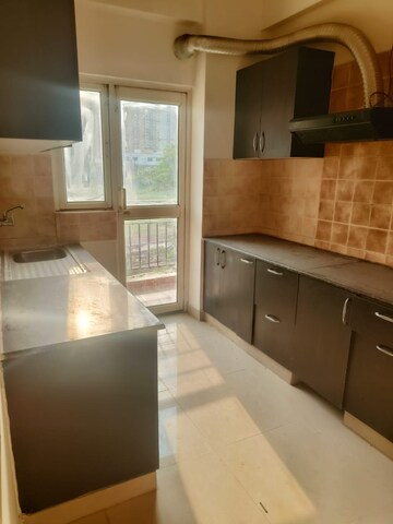 Kitchen in 3 BHK Apartment at Gardenia Golf City, Sector 75 – for Rent
