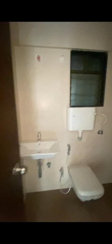 Bathroom in 2 BHK Apartment at Omkar Signet, Malad East – for Rent