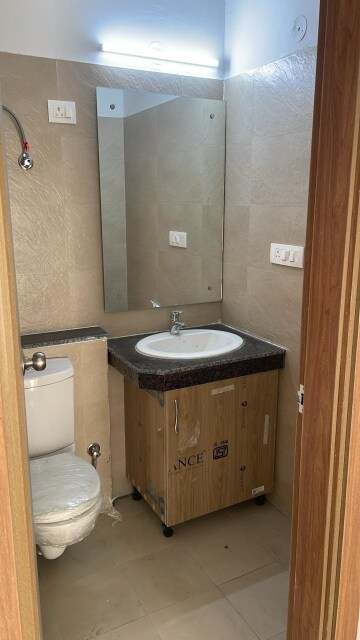 Bathroom in 3 BHK Apartment at ATS Homekraft Pious Hideaways, Sector 150 – for Rent