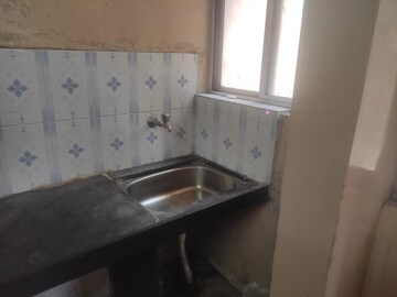 Kitchen in Studio Apartment at Guruwar Peth – for Rent