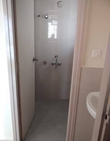 Bathroom in 1 BHK Apartment at Lodha Palava Crown, Dombivli East – for Rent