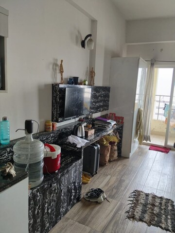 Living Room in 1 BHK Apartment at Paramount Golfforeste Villas, Zeta I Greater Noida – for Rent