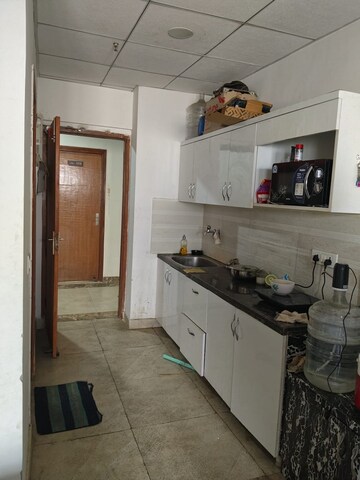 Kitchen in 1 RK Apartment at Paramount Golfforeste Villas, Zeta I Greater Noida – for Rent