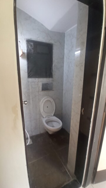 Bathroom in 2 BHK Apartment at Rustomjee Urbania Acura, Majiwada – for Rent