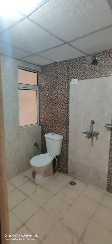 Bathroom in 2 BHK Apartment at JKG Palm Resort, Raj Nagar Extension – for Rent