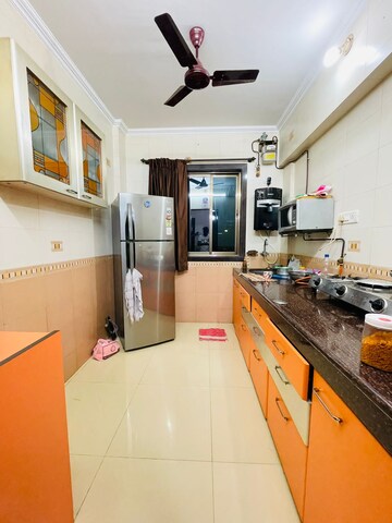 Kitchen in 2 BHK Apartment at Hiranandani Estate Winona, Ghodbunder Road – for Rent