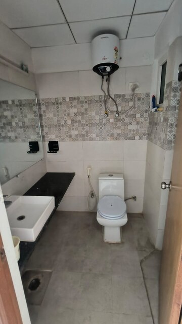Master Bedroom in 1 BHK Apartment at Paramount Golfforeste Villas, Zeta I Greater Noida – for Rent