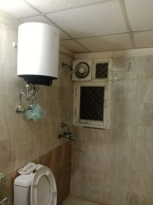 Bathroom in 2 BHK Apartment at Aims Golf City, Sector 75 – for Sale