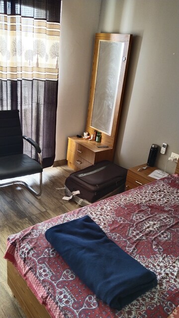 Living Room in 1 BHK Apartment at Paramount Golfforeste Villas, Zeta I Greater Noida – for Rent