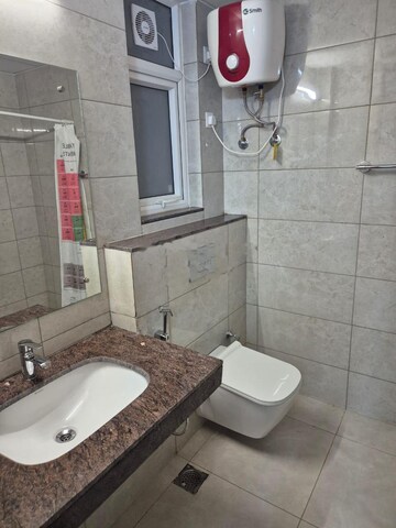 Bathroom in 3 BHK Apartment at Emaar Palm Heights, Sector 77 – for Rent