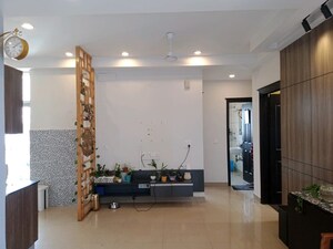 Living Room in 2.5 BHK Apartment at Aims Golf City, Sector 75 – for Sale