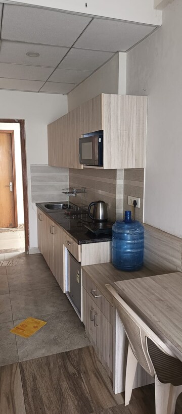 Kitchen in 1 RK Apartment at Paramount Golfforeste Villas, Zeta I Greater Noida – for Rent