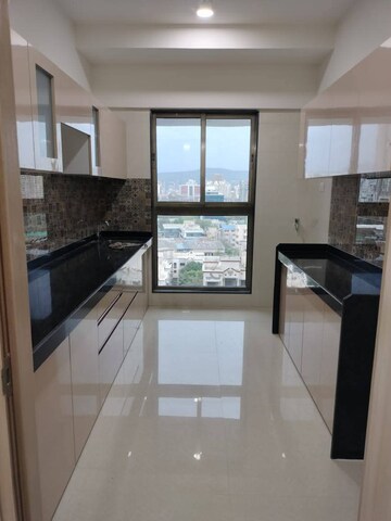 Kitchen in 2 BHK Apartment at Rajesh Raj Infinia, Malad West – for Rent