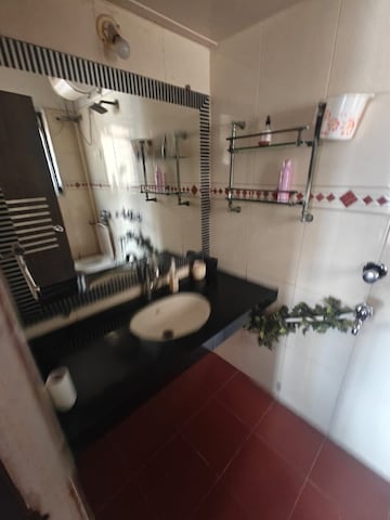 Living Room in 2 BHK Apartment at Palash Towers, Andheri West – for Rent