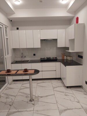 Kitchen in 4 BHK Apartment at Raj Nagar Extension – for Sale