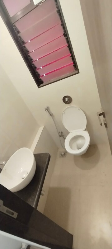 Bathroom in 2 BHK Apartment at Millionaire Heritage, Andheri West – for Rent